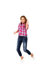 Happy young woman jumping giving thumbs up
