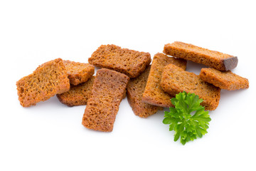Bread croutons isolated on a white background.