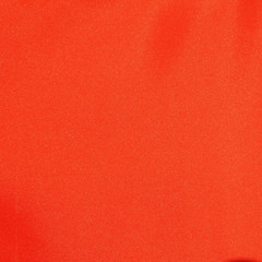 red satin or silk fabric cloth as background texture
