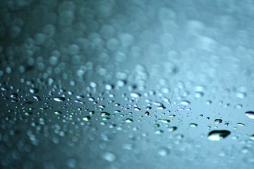 Raindrops on glass, selective focus.
