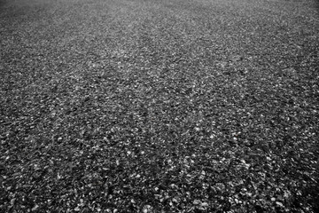 Asphalt closeup textured background.