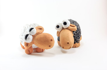 Sheep decorations and toy isolated on a white background