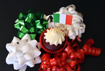 Italian Republic Day cupcake with red, white and green italian flag. National Liberation Day. Festa della Repubblica Italiana. Italy flag on cupcake.