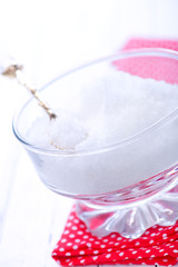 white sugar in glass bank