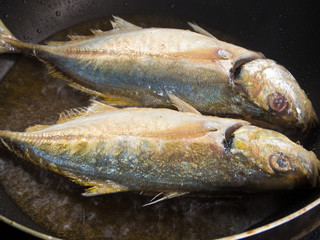 Sea fish frying in a Pan