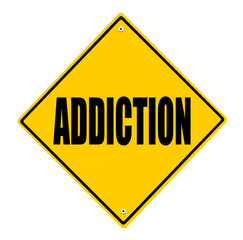 addiction yellow road sign