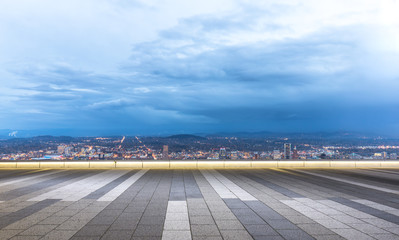 empty floor with cityscape and skyline of portland at twilight