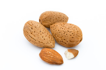 Group of almond nuts. Isolated on a white background.