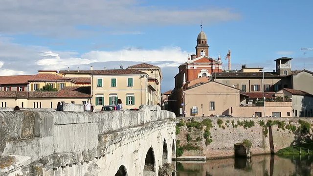 Tiberius bridge and old buildings Rimini