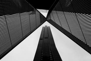 Melbourne CBD architecture - metal scultpture and skyscraper in black and white - 114968524