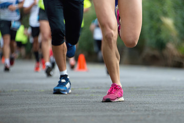People running in the park for the marathon race