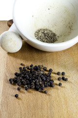 The black pepper ground in a mortar