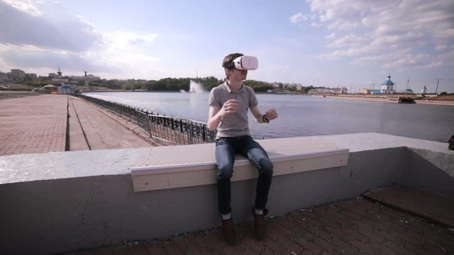 Young man in 360 VR glasses. Virtual reality glasses. 1080p.
