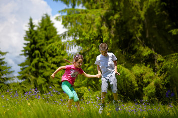 Obraz premium Kids spend a time enjoying in charms of untouched nature