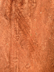 Tire tracks on the road gravel stone background