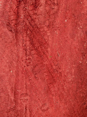 Tire tracks on the red road gravel stone background