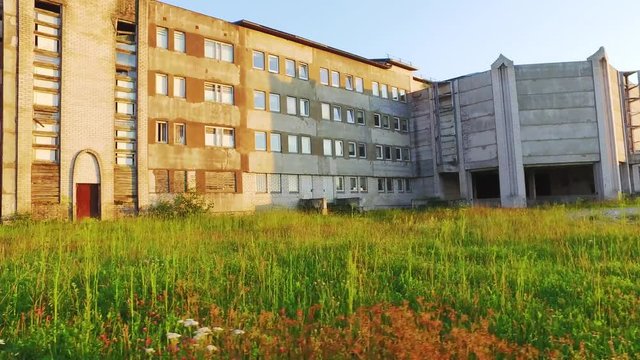Walk along a street. Steadicam shot. Sunset landscape.
