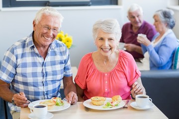 Senior couple having lunch together