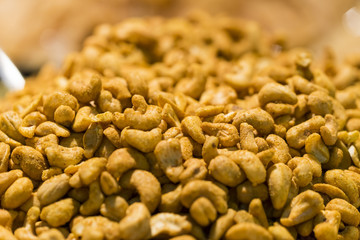 pile of roasted and salted cashew nuts in a bazaar