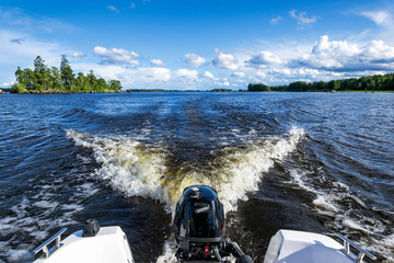 Boat travelling on Swedish lake