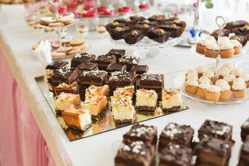 Different kinds of baked sweets on a buffet