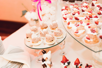 Different kinds of baked sweets on a buffet
