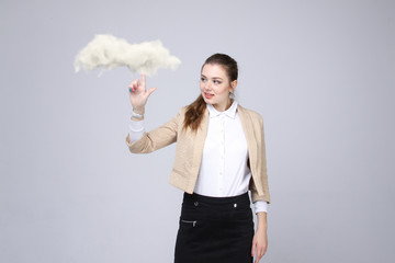Young woman and cloud, cloud computing concept