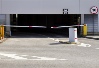 Barrier on the car parking. Parkings entrance in business center.