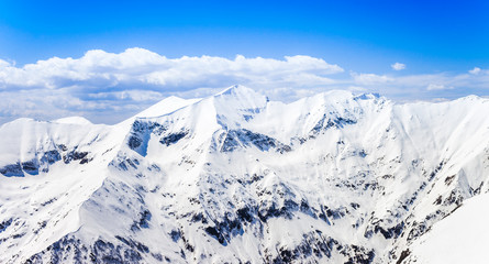 mountain peaks in winter time