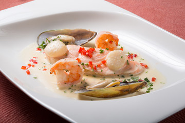 Seafood cream soup with shrimps