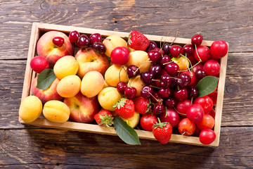 fresh fruits in wooden box