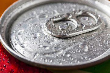 Top part of beer cans with water drops.Close up view