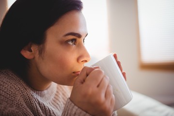 Close-up of woman drinking coffee