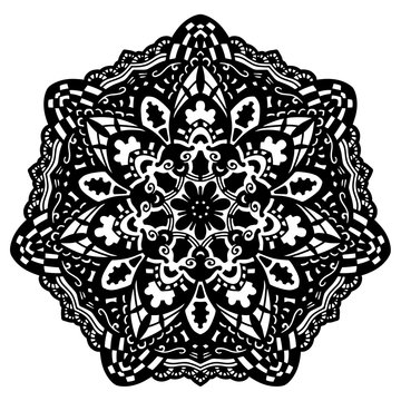Round element for coloring book. Black and white ethnic henna pattern. Floral mandala.Black and white pattern. Ethnic henna hand drawn background for coloring book, textile or wrapping.