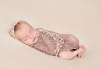 cute sleeping newborn girl close-up