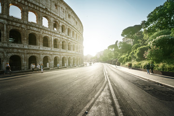 Naklejka premium road to Colosseum in sunset time, Rome, Italy