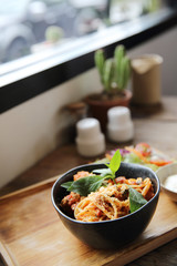 spaghetti and meatballs on wood background italian food