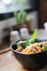 spaghetti and meatballs on wood background italian food