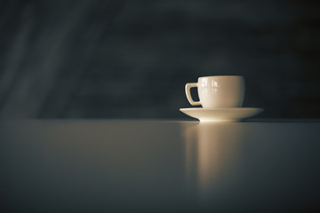 Coffee cup on dark background