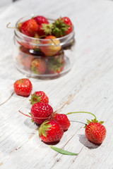 Strawberry close up on white boards