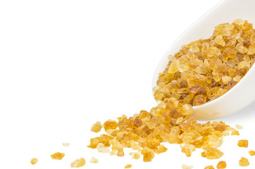 Rock sugar in cup isolated