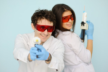 two dentist with dental instruments in the hands of