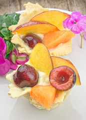 Pastries with cream and fresh fruits