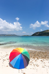 Colorful umbrellas on beach.