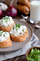 Cottage cheese with whole wheat rolls for breakfast