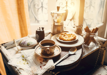Vintage style morning coffee with biscuits