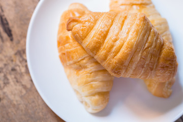 Danish pastry on the wooden table
