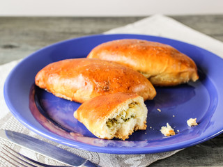 the bakery products on a blue plate