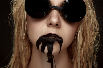 Beauty female Model with Oil from her Mouth