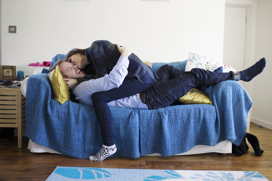 Young Couple Having Fun At Home 